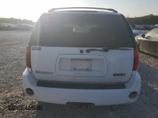 2004 GMC Envoy SLE with VIN 1GKDS13S542233286, listed as a Copart auction lot 76129164 with 228,981 mi miles and Salvage Title. Bid and sale history available at carsss.com. Image 6.