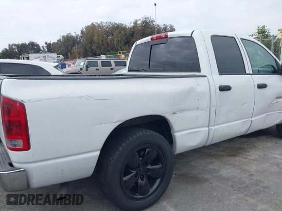 2003 Dodge 1500 ST z VIN 1D7HA18D03S241651, wystawiony jako IAAI lot #42037511 z przebiegiem 138 934 mil mil oraz . Historia ofert i sprzedaży dostępna na DreamBid. Obrazek 6.