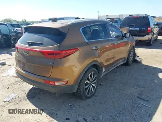 2017 Kia Sportage EX with VIN KNDPN3AC9H7074904, listed as a IAAI auction lot 42228027 with 129,067 mi miles and . Bid and sale history available at DreamBid. Image 4.