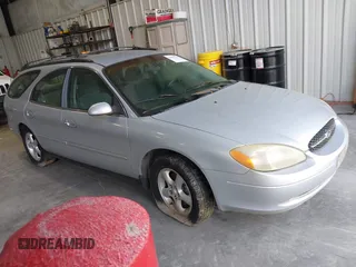 2001 Ford Taurus SE Standard with VIN 1FAFP58U91G202523, listed as a IAAI auction lot 42092190 with 197,961 mi miles. Bid and sale history available at carsss.com. Image 1.