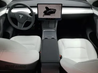 2025 Tesla Model Y Long Range with VIN 7SAYGDED6SF228626, listed as a Copart auction lot 47654525 with 2,087 mi miles and Salvage Title. Bid and sale history available at DreamBid. Image 8.