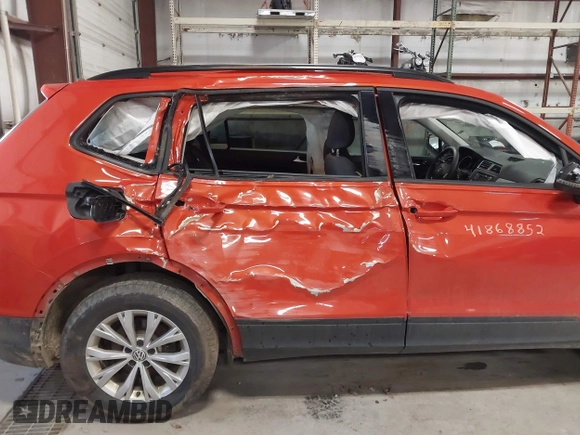 2018 Volkswagen Tiguan S with VIN 3VV0B7AX4JM019424, listed as a IAAI auction lot 41868852 with 50,889 mi miles and . Bid and sale history available at DreamBid. Image 6.