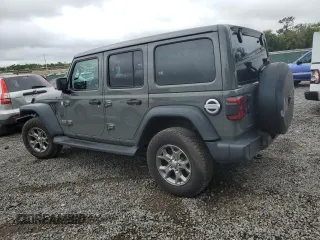 2020 Jeep Wrangler Unlimited Freedom with VIN 1C4HJXDG0LW285901, listed as a Copart auction lot 52193555 with 63,823 mi miles and Salvage title. Bid and sale history available at DreamBid. Image 2.