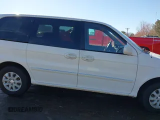 2005 Kia Sedona LX with VIN KNDUP132956703200, listed as a IAAI auction lot 41700159 with 125,578 mi miles. Bid and sale history available at carsss.com. Image 13.