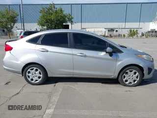 2012 Ford Fiesta SE with VIN 3FADP4BJ2CM150953, listed as a IAAI auction lot 42010904 with 77,637 mi miles. Bid and sale history available at carsss.com. Image 13.