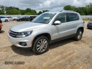 2013 Volkswagen Tiguan SE with VIN WVGAV7AX0DW556558, listed as a Copart auction lot 55574395 with 94,882 mi miles and Salvage title. Bid and sale history available at DreamBid. Image 1.