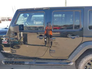 2008 Jeep Wrangler Unlimited Rubicon with VIN 1J8GA69198L574593, listed as a IAAI auction lot 41412045 with 174,727 mi miles and . Bid and sale history available at DreamBid. Image 15.