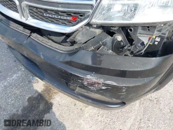 2013 Dodge Journey SE with VIN 3C4PDCAB0DT710609, listed as a IAAI auction lot 41763431 with 145,851 mi miles and . Bid and sale history available at DreamBid. Image 15.