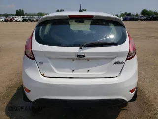 2015 Ford Fiesta SE z VIN 3FADP4EJ7FM169000, wystawiony jako Copart lot #64402674 z przebiegiem 191 221 mil mil oraz Szkoda całkowita • Salvage title. Historia ofert i sprzedaży dostępna na DreamBid. Obrazek 6.