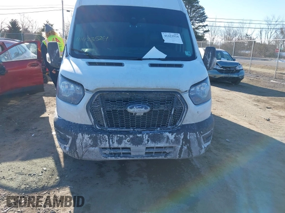2021 Ford Transit Cargo with VIN 1FTBW3X82MKA14027, listed as a IAAI auction lot 41423524 with 121,221 mi miles. Bid and sale history available at carsss.com. Image 12.