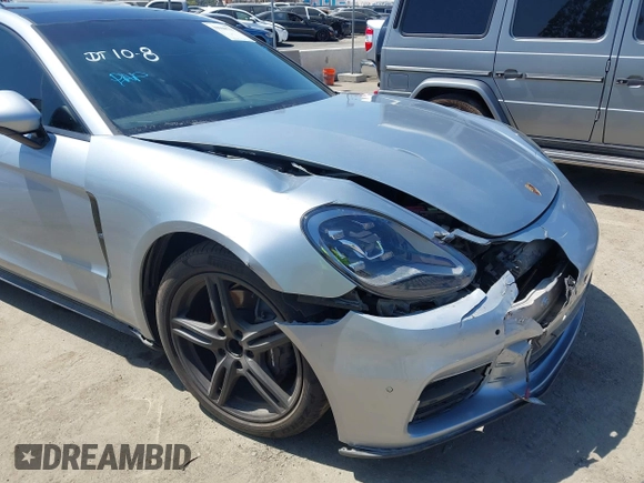 2020 Porsche Panamera z VIN WP0AA2A75LL101708, wystawiony jako IAAI lot #39900713 z przebiegiem 13 098 mil mil oraz . Historia ofert i sprzedaży dostępna na DreamBid. Obrazek 6.