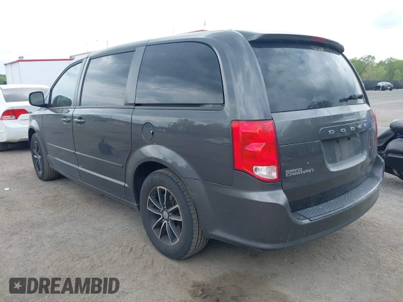 2015 Dodge Grand Caravan American Value with VIN 2C4RDGBG2FR542844, listed as a IAAI auction lot 42109983 with 129,718 mi miles and . Bid and sale history available at DreamBid. Image 3.