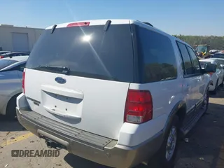 2004 Ford Expedition Eddie Bauer with VIN 1FMPU17L64LB55970, listed as a IAAI auction lot 41883203 with 319,583 mi miles. Bid and sale history available at carsss.com. Image 4.