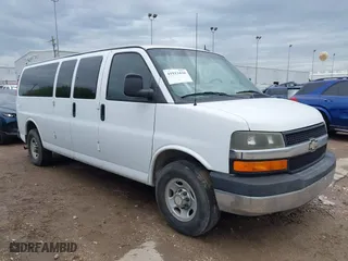 2014 Chevrolet Express Passenger LT with VIN 1GAZG1FG6E1119310, listed as a IAAI auction lot 41913430 with 130,442 mi miles. Bid and sale history available at carsss.com. Image 1.
