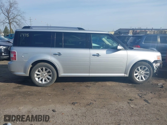 2011 Ford Flex SEL z VIN 2FMGK5CC2BBD21448, wystawiony jako IAAI lot #41814326 z przebiegiem 153 700 mil mil oraz . Historia ofert i sprzedaży dostępna na DreamBid. Obrazek 13.
