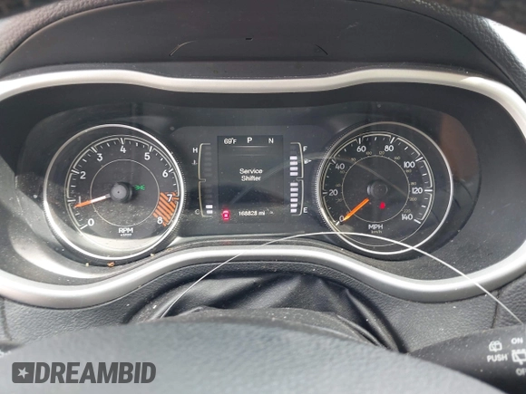 2015 Jeep Cherokee Latitude z VIN 1C4PJMCS3FW557734, wystawiony jako IAAI lot #42273937 z przebiegiem 168 828 mil mil oraz . Historia ofert i sprzedaży dostępna na DreamBid. Obrazek 7.
