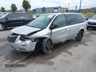 2005 Chrysler Town & Country LX with VIN 2C4GP44R95R307156, listed as a IAAI auction lot 40843940 with Not Provided miles and . Bid and sale history available at DreamBid. Image 18.