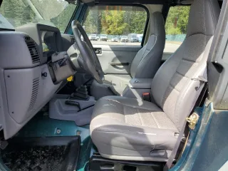 1997 Jeep Wrangler Sport with VIN 1J4FY19S4VP537511, listed as a Copart auction lot 55453975 with 59,714 mi miles and Clean Title. Bid and sale history available at carsss.com. Image 7.