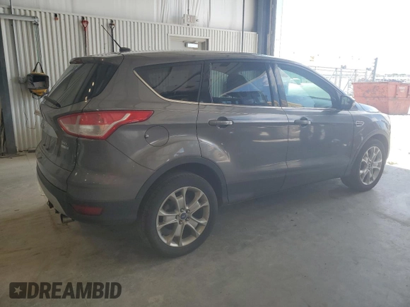 2013 Ford Escape SEL with VIN 1FMCU9H93DUA35005, listed as a Copart auction lot 63867005 with 209,362 mi miles and Clean title. Bid and sale history available at DreamBid. Image 3.
