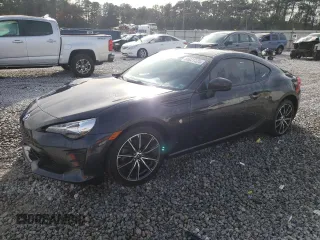 2017 Toyota 86 with VIN JF1ZNAA17H8706326, listed as a Copart auction lot 84821124 with 93,159 mi miles and Salvage Title. Bid and sale history available at carsss.com. Image 1.