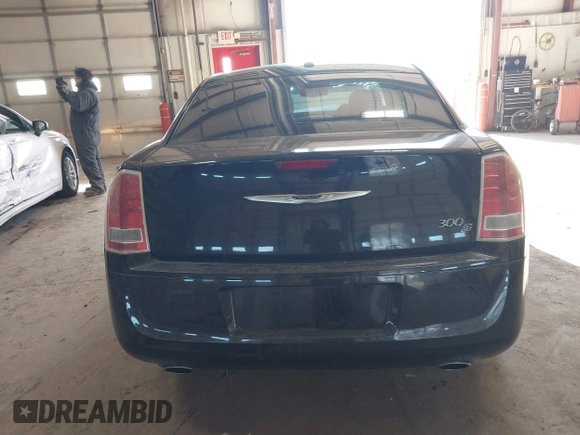 2013 Chrysler 300 with VIN 2C3CCABT1DH503835, listed as a IAAI auction lot 41303335 with 105,606 mi miles. Bid and sale history available at carsss.com. Image 16.