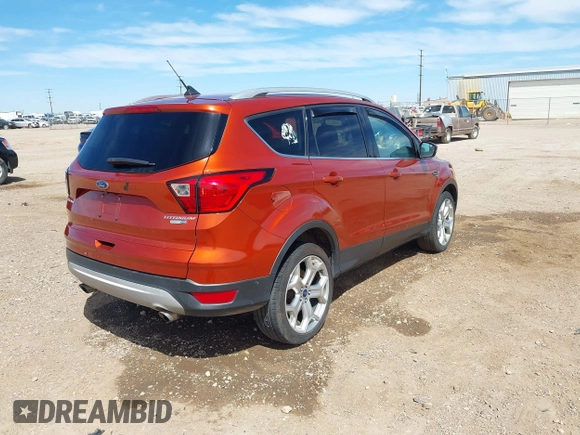 2019 Ford Escape Titanium with VIN 1FMCU9J92KUB28895, listed as a IAAI auction lot 42065235 with 112,305 mi miles and . Bid and sale history available at DreamBid. Image 4.