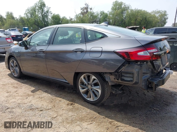 2018 Honda Clarity with VIN JHMZC5F12JC013732, listed as a IAAI auction lot 42157758 with 162,470 mi miles. Bid and sale history available at carsss.com. Image 3.