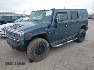 2005 Hummer H2 SUV z VIN 5GRGN23U95H100888, wystawiony jako IAAI lot #41937351 z przebiegiem 202 969 mil mil oraz . Historia ofert i sprzedaży dostępna na DreamBid. Obrazek 18.