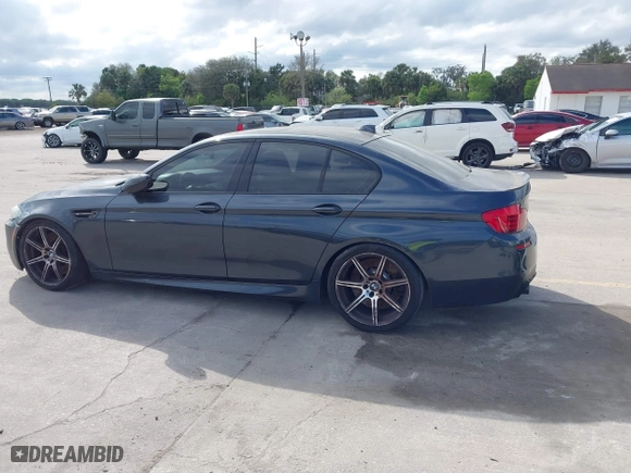 2013 BMW M5 with VIN WBSFV9C59DD096774, listed as a IAAI auction lot 41608286 with 82,601 mi miles. Bid and sale history available at carsss.com. Image 14.