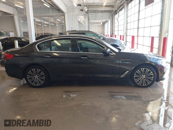 2018 BMW 5 Series 530i xDrive with VIN WBAJA7C55JWA73459, listed as a IAAI auction lot 41634921 with 64,759 mi miles and . Bid and sale history available at DreamBid. Image 13.