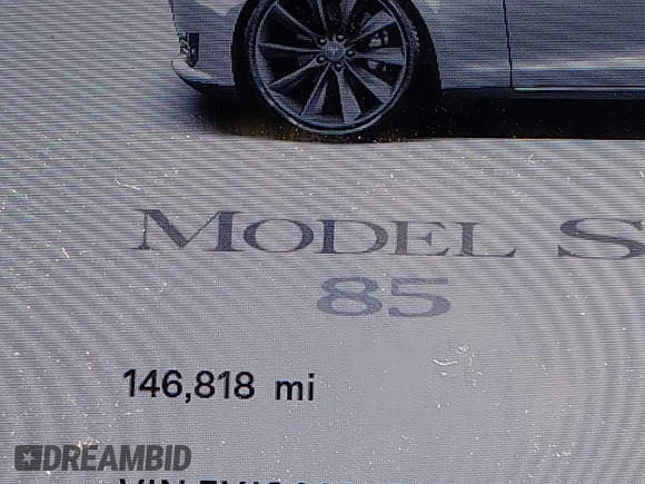 2013 Tesla Model S with VIN 5YJSA1CN5DFP11381, listed as a IAAI auction lot 42087803 with 146,818 mi miles and . Bid and sale history available at DreamBid. Image 7.