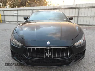 2019 Maserati Ghibli z VIN ZAM57XSA3K1325881, wystawiony jako Copart lot #80973694 z przebiegiem 64 189 mil mil oraz Szkoda całkowita • Salvage title. Historia ofert i sprzedaży dostępna na DreamBid. Obrazek 5.