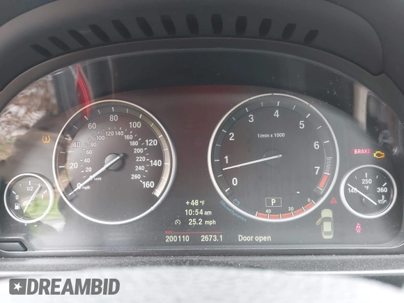2012 BMW 5 Series 528i with VIN WBAXG5C5XCDX01864, listed as a IAAI auction lot 41910337 with 200,110 mi miles. Bid and sale history available at carsss.com. Image 7.