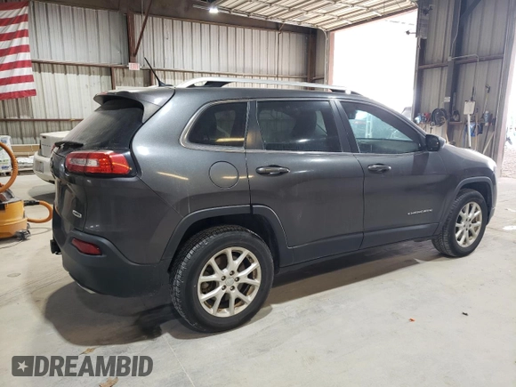 2015 Jeep Cherokee Latitude with VIN 1C4PJMCS7FW504728, listed as a Copart auction lot 81674984 with 144,342 mi miles and Salvage Title. Bid and sale history available at carsss.com. Image 3.
