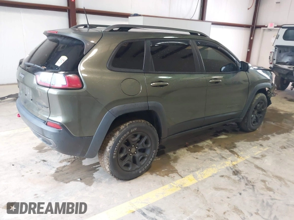 2020 Jeep Cherokee Trailhawk Elite with VIN 1C4PJMBN2LD538076, listed as a IAAI auction lot 42219282 with 53,773 mi miles and . Bid and sale history available at DreamBid. Image 4.