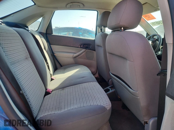 2007 Ford Focus S z VIN 1FAFP34N87W107744, wystawiony jako Copart lot #61934615 z przebiegiem Nie podano mil oraz Szkoda całkowita • Salvage title. Historia ofert i sprzedaży dostępna na DreamBid. Obrazek 10.