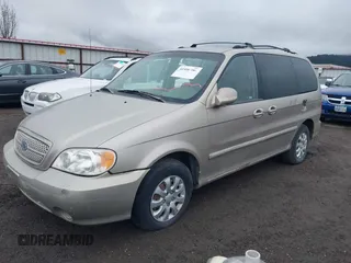 2004 Kia Sedona LX with VIN KNDUP131746563430, listed as a IAAI auction lot 41896386 with 141,526 mi miles. Bid and sale history available at carsss.com. Image 2.