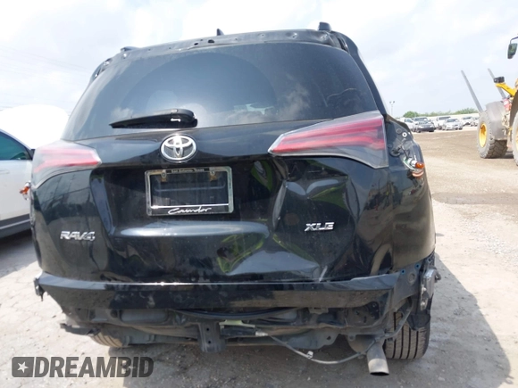2018 Toyota RAV4 XLE z VIN 2T3WFREV4JW495379, wystawiony jako IAAI lot #42406849 z przebiegiem 132 126 mil mil oraz . Historia ofert i sprzedaży dostępna na DreamBid. Obrazek 6.
