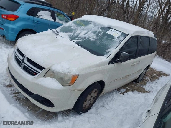 2012 Dodge Grand Caravan SE with VIN 2C4RDGBG2CR419489, listed as a IAAI auction lot 41270114 with 124,869 mi miles. Bid and sale history available at carsss.com. Image 2.