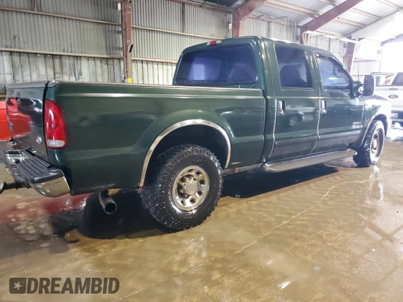 2002 Ford F-250 XL with VIN 1FTNW20F52EA52699, listed as a Copart auction lot 84088814 with 299,869 mi miles and Salvage Title. Bid and sale history available at DreamBid. Image 3.