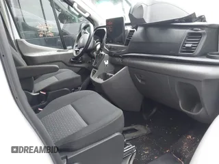 2022 Ford Transit Passenger XL with VIN 1FBAX2C88NKA79625, listed as a IAAI auction lot 41490410 with 27,521 mi miles and . Bid and sale history available at DreamBid. Image 5.