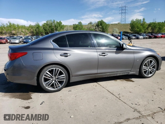 2015 Infiniti Q50 Premium z VIN JN1BV7AR6FM401105, wystawiony jako Copart lot #56982265 z przebiegiem 108 256 mil mil oraz Czysty tytuł • Clean title. Historia ofert i sprzedaży dostępna na DreamBid. Obrazek 3.