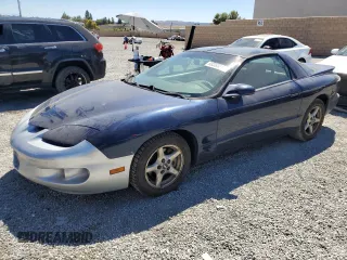 2000 Pontiac Firebird Firebird z VIN 2G2FS22K1Y2160613, wystawiony jako Copart lot #68363214 z przebiegiem 211 139 mil mil oraz Tytuł czysty. Historia ofert i sprzedaży dostępna na DreamBid. Obrazek 1.