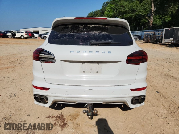 2015 Porsche Cayenne S with VIN WP1AB2A24FLA59813, listed as a Copart auction lot 60604305 with 137,719 mi miles and Salvage title. Bid and sale history available at DreamBid. Image 6.