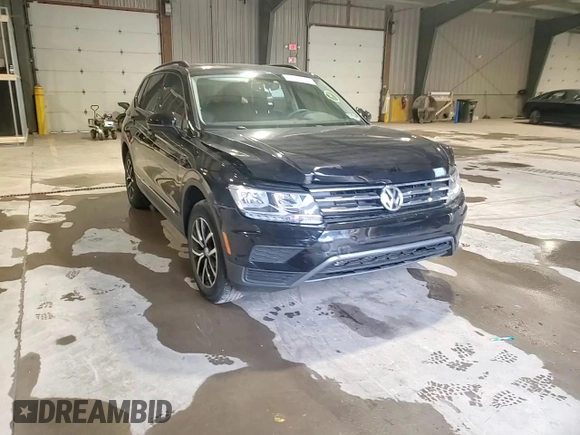 2021 Volkswagen Tiguan SE with VIN 3VV2B7AXXMM071024, listed as a Copart auction lot 52243675 with 31,448 mi miles and Salvage Title. Bid and sale history available at DreamBid. Image 11.