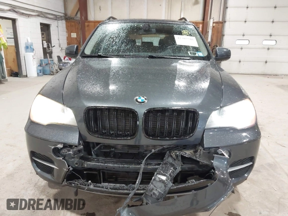 2012 BMW X5 35i z VIN 5UXZV4C59CL985715, wystawiony jako IAAI lot #42307586 z przebiegiem 105 147 mil mil oraz . Historia ofert i sprzedaży dostępna na DreamBid. Obrazek 6.