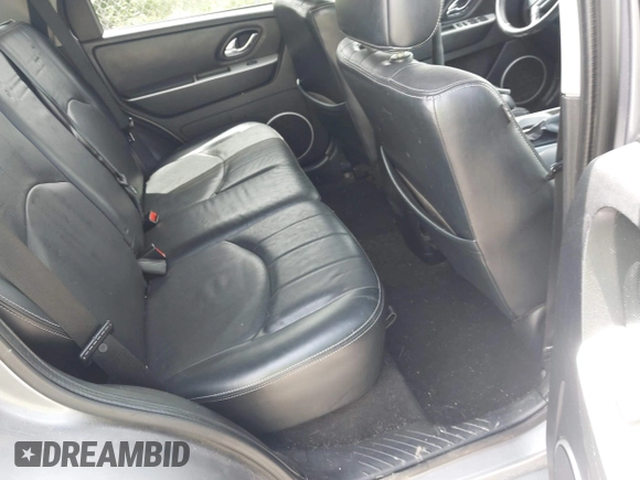 2007 Mercury Mariner Luxury with VIN 4M2CU91157KJ09026, listed as a IAAI auction lot 42312495 with 156,572 mi miles and . Bid and sale history available at DreamBid. Image 8.