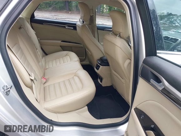 2013 Ford Fusion SE Hybrid z VIN 3FA6P0LU1DR291060, wystawiony jako IAAI lot #42731674 z przebiegiem 93 918 mil mil oraz . Historia ofert i sprzedaży dostępna na DreamBid. Obrazek 8.