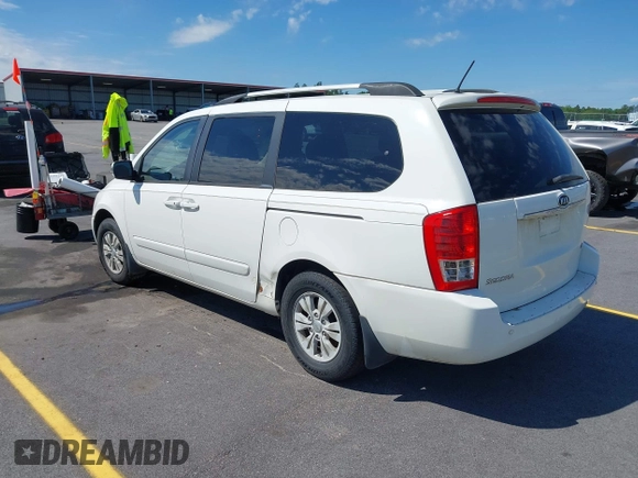 2012 Kia Sedona LX with VIN KNDMG4C71C6447550, listed as a IAAI auction lot 42190357 with 161,960 mi miles. Bid and sale history available at carsss.com. Image 3.