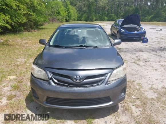 2011 Toyota Corolla L with VIN 2T1BU4EE0BC680158, listed as a IAAI auction lot 42060987 with 131,669 mi miles. Bid and sale history available at carsss.com. Image 12.